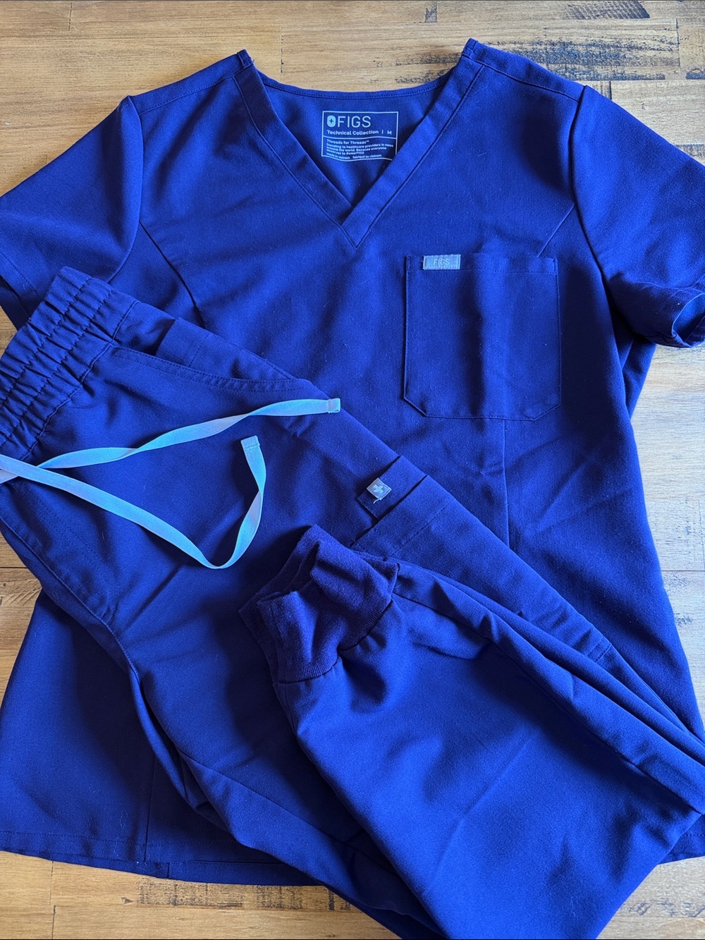 Figs Women’s Short Sleeve Scrub Top and Pants in Purple
